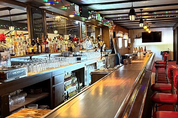 50-foot full-service bar with wood finish